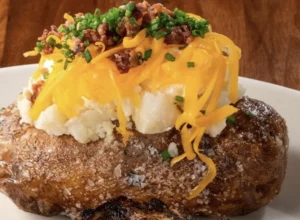 The Ultimate Spud: Culinary Experts Reveal Where to Find the Best Loaded Baked Potatoes