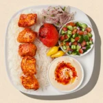 The Global Comfort Staple: 5 Restaurant Chains Mastering the Art of Chicken and Rice