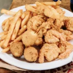The Art of the Golden Fry: A Deep Dive into the Nation’s Top Fried Shrimp and Hush Puppy Destinations