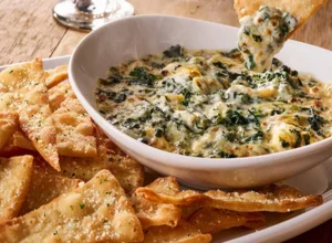 The Ultimate Comfort: Decoding the Cult Following of Restaurant Spinach-Artichoke Dip