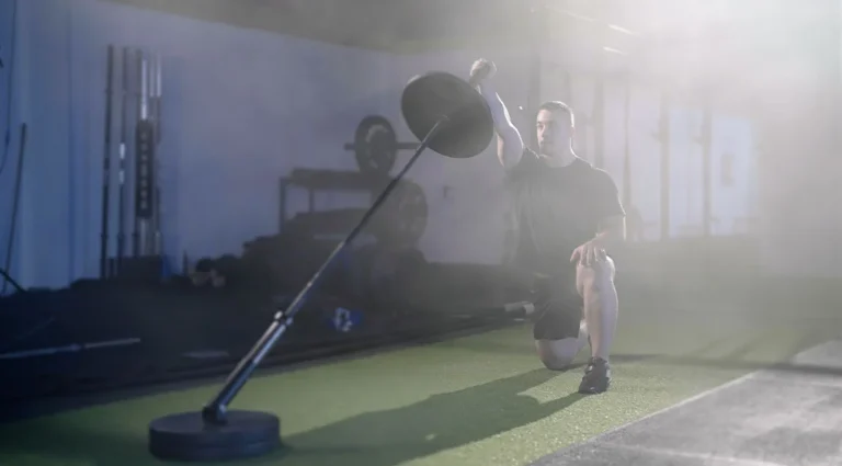 Mastering the Half-Kneeling Landmine Press: The Science of the Perfect Setup